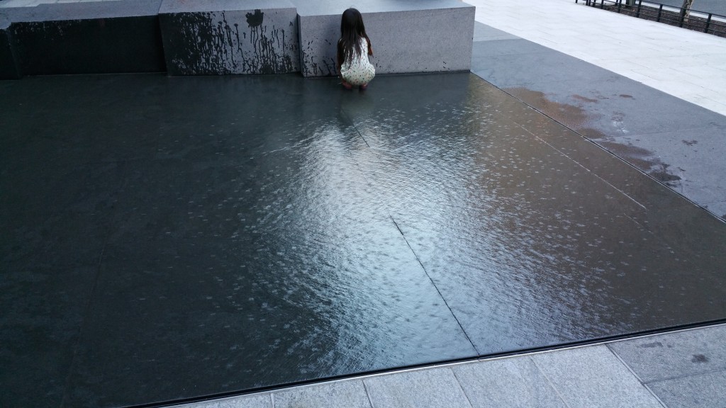 Girl playing in public fountain/installation in Washington, DC, 2015. Photo: Me.